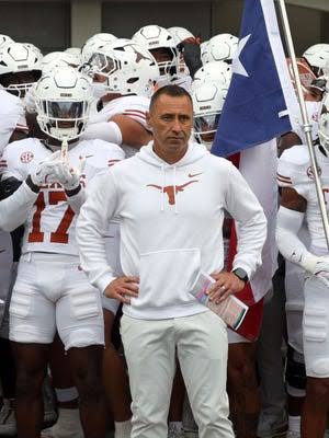 texas football coach